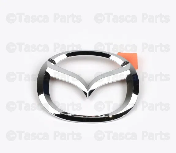 Bumper Cover Emblem - Mazda (F151-51-731A)