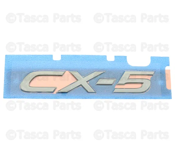 Hatch Emblem - Mazda (KB7W-51-721A)