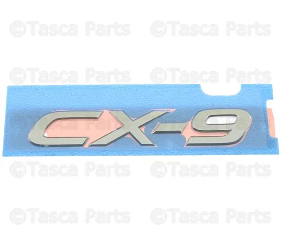 Hatch Emblem - Mazda (TK78-51-721A)